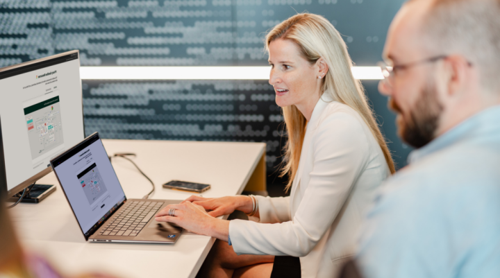 People sitting at a laptop 